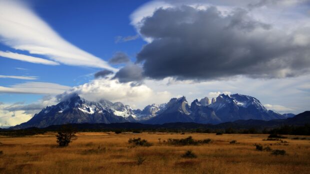 Snow capped mountains and clouds at Torres Del Paine National Park, 4K Desktop Wallpaper