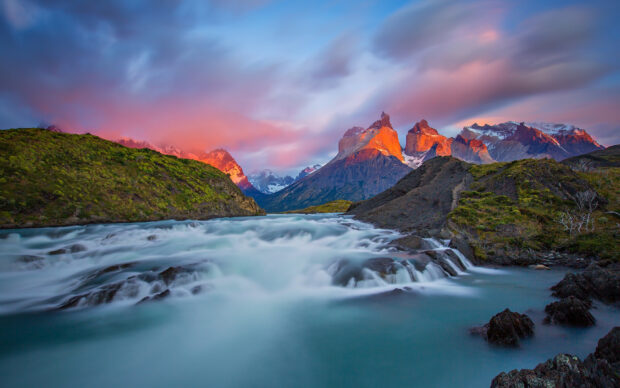 A flowing river runs through Torres Del Paine National Park with mountains illuminated by sunset, HD Desktop Wallpaper