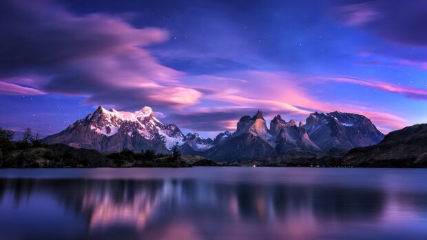 The Torres Del Paine National Park showcases stunning mountains under a vibrant twilight sky, 4K Desktop Wallpaper