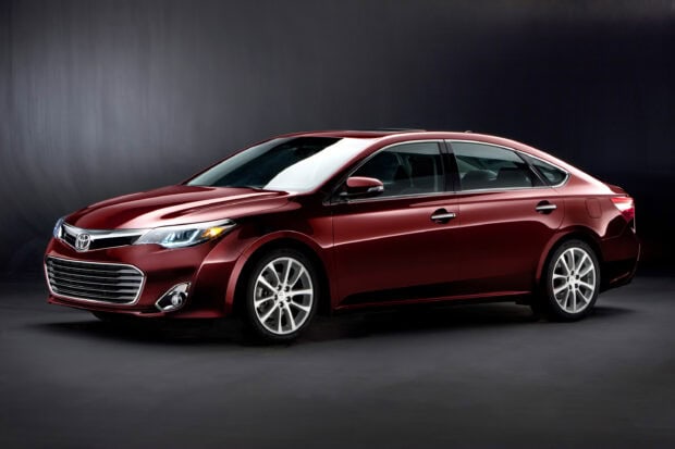 A deep red Toyota Avalon is showcased against a dark background, 2K Desktop Wallpaper