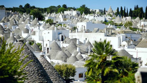 The unique trulli houses with stone roofs fill the landscape of Alberobello, Italy, HD Desktop Wallpaper