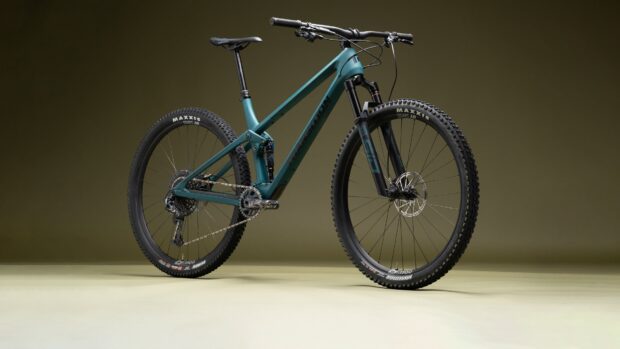 A blue Transition Bikes model displayed on a plain surface with a neutral background, HD Desktop Wallpaper