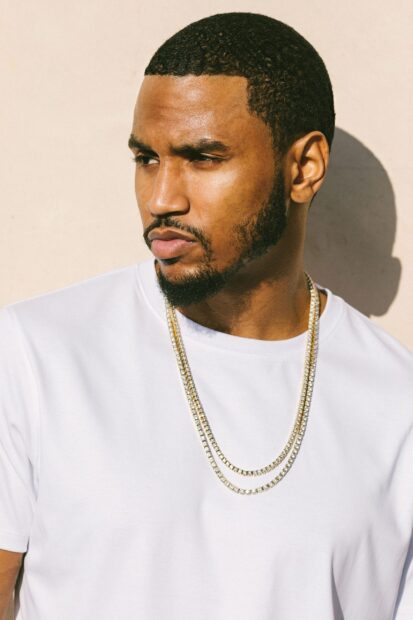 Trey Songz wears a white shirt and gold chains in this close up portrait, 2K Phone Wallpaper