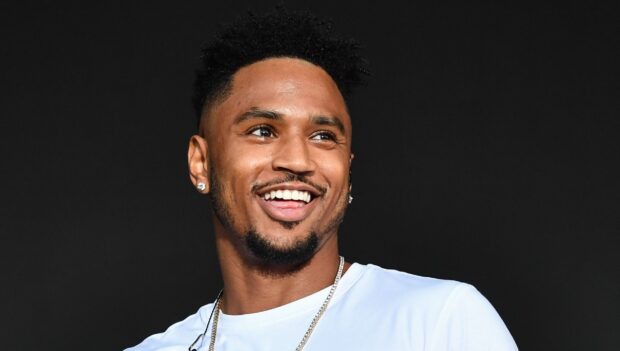 Trey Songz smiling and looking to the side in this portrait image, HD Desktop Wallpaper