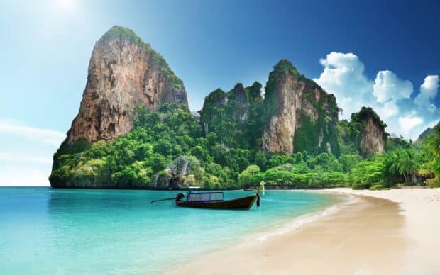 Thailand, A traditional boat floats near a sandy beach with limestone cliffs in Phuket, Philippines Wallpapers, 2K Desktop Wallpaper