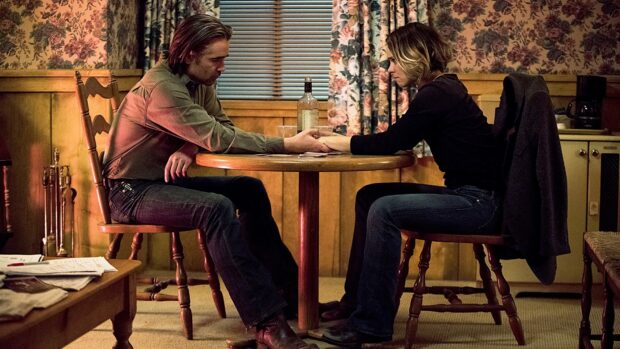 Two characters hold hands at a table sharing a tense moment, HD Desktop Wallpaper