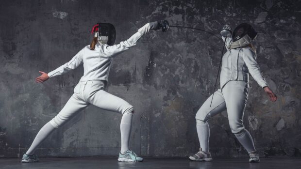 Two athletes wearing protective gear are engaged in a fencing match, HD Desktop Wallpaper