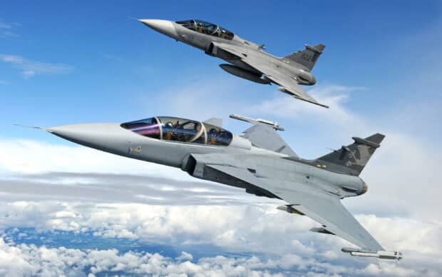 Two jet fighters soaring in the blue sky with pilots inside, 2K Desktop Wallpaper