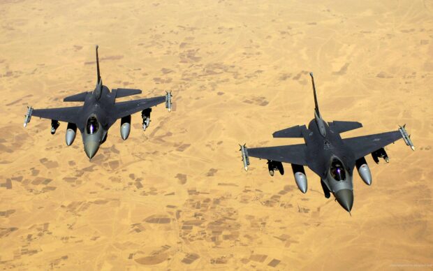 Two jet fighters flying in formation above a sandy desert landscape, HD Desktop Wallpaper