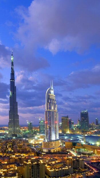 The United Arab Emirates city skyline glows at dusk with iconic skyscrapers, HD Mobile Wallpaper