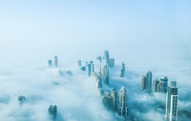 A foggy view of Dubai city towers representing United Arab Emirates wallpapers, HD Desktop Wallpaper