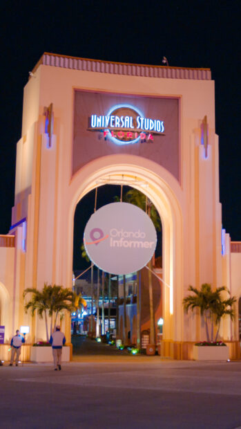 The Universal Studios Florida entrance is brightly lit at night featuring Orlando Wallpapers, 2K Mobile Wallpaper