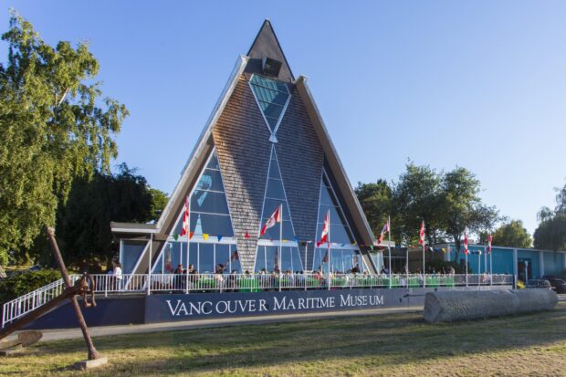 The Vancouver Maritime Museum building features a unique triangular roof and flag decorations, 2K Desktop Wallpaper