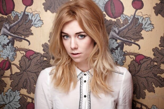 Vanessa Kirby wallpapers showing a thoughtful woman with blonde hair, 2K Desktop Wallpaper