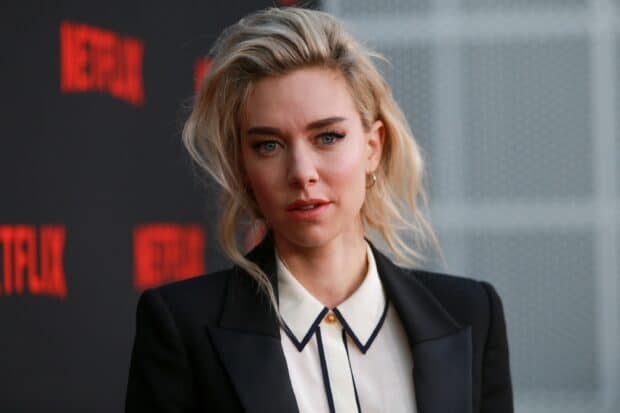Vanessa Kirby stands confidently wearing a black blazer and white shirt, 2K Desktop Wallpaper