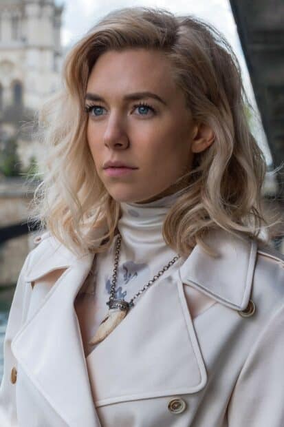 Vanessa Kirby wallpapers feature a close up portrait of Vanessa Kirby wearing a white coat and unique necklace, 2K Mobile Wallpaper
