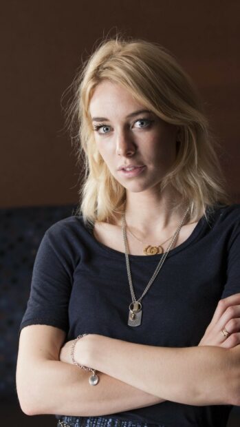 Vanessa Kirby has a confident expression with her arms crossed, HD Phone Wallpaper