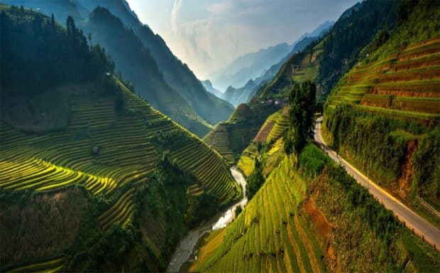 The Vietnam Wallpapers shows terraced rice fields and a river flowing through valleys between mountains, HD Desktop Wallpaper