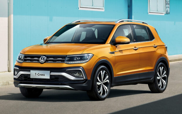 A bright yellow Volkswagen T Cross parked in front of a turquoise wall, HD Desktop Wallpaper