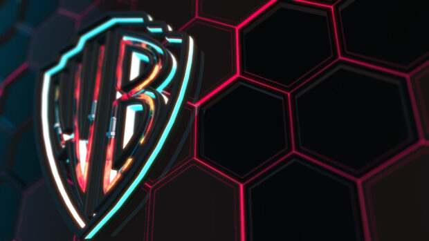 A glowing Warner Bros logo is displayed on a dark hexagon background with neon outlines, HD Desktop Wallpaper