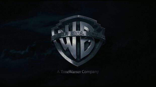The Warner Bros emblem is shown with a dark background in this Warner Bros Wallpapers, HD Desktop Wallpaper