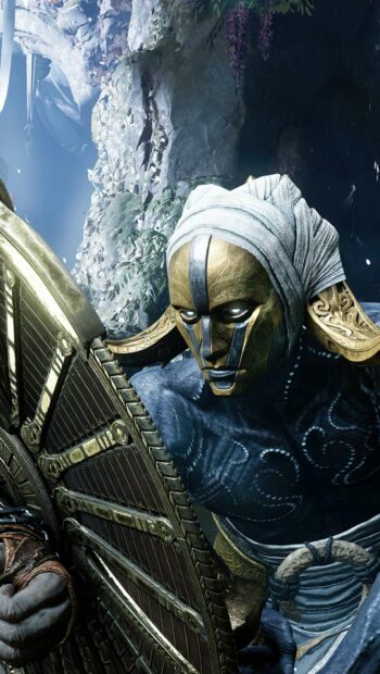 The God Of War Wallpapers feature a fierce warrior holding a decorated shield and wearing a golden mask
