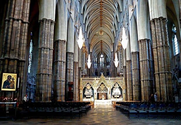 The grand interior of Westminster Abbey displays Gothic architecture with detailed pillars, HD Desktop Wallpaper