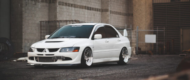 Lancer Evo Wallpapers in an urban setting, 2K Desktop Wallpaper