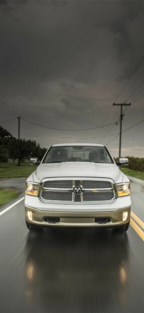 A white Ram pickup truck is driving through a rainy and cloudy environment, HD Mobile Wallpaper