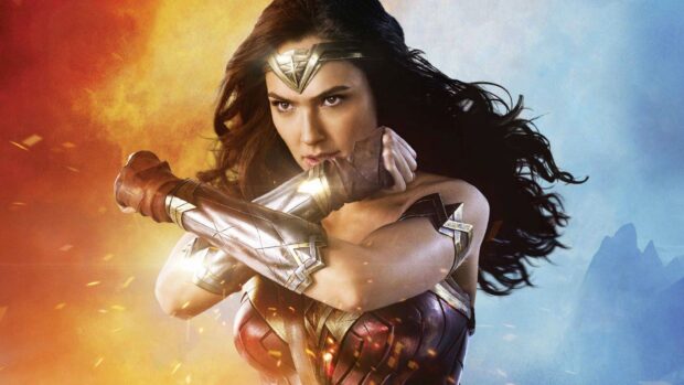 Wonder Woman movie wallpapers features a fierce action pose with crossed arms, HD Desktop Wallpaper