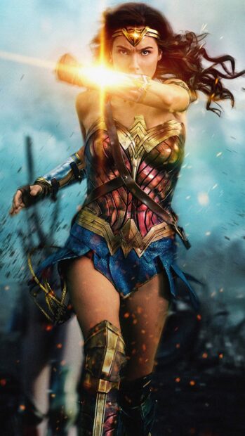 Wonder Woman is in battle using her glowing shield to block attacks, 4K Mobile Wallpaper