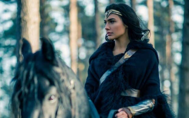 Wonder Woman in a forest riding a horse wearing armor and fur cloak, HD Desktop Wallpaper