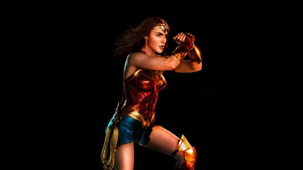 Wonder Woman movie character ready for combat in a dynamic stance, 4K Desktop Wallpaper