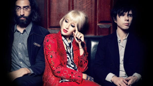 The Yeah Yeah Yeahs sit closely in an artistic photo with unique fashion styles, HD Desktop Wallpaper