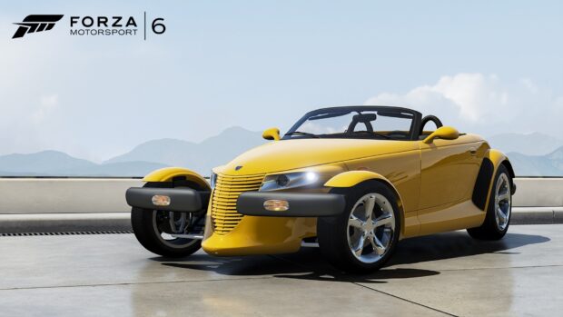 A yellow Plymouth Prowler is parked outdoors with mountains in the background, HD Desktop Wallpaper
