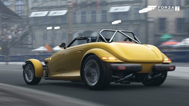 A yellow Plymouth Prowler is racing down an urban road with blurred buildings in the background, HD Desktop Wallpaper