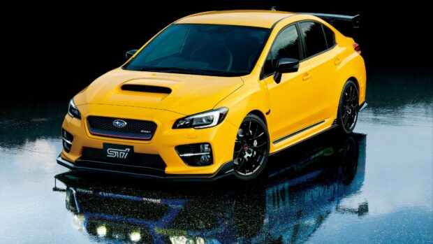A sleek yellow Subaru WRX is parked on a wet reflective surface, showcasing its sporty design, 4K Desktop Wallpaper