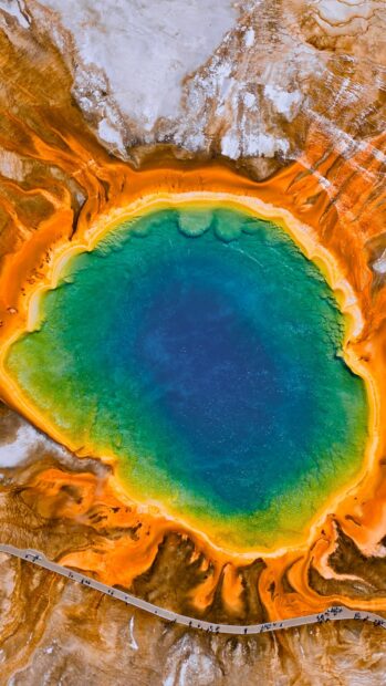 Aerial view of Yellowstone National Park hot spring showing vivid orange and blue hues, HD Mobile Wallpaper