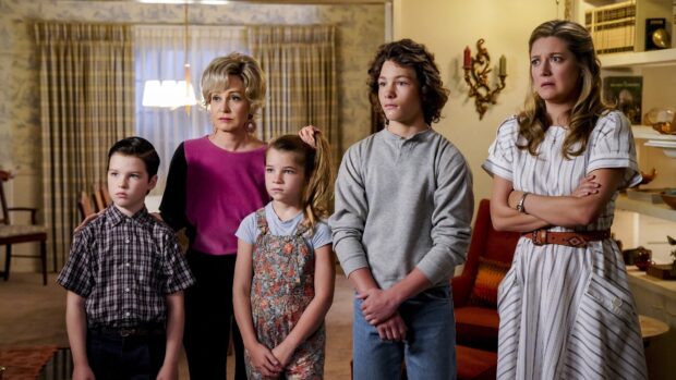 The Young Sheldon Tv Series cast stands together with serious expressions in a living room scene, 4K Desktop Wallpaper