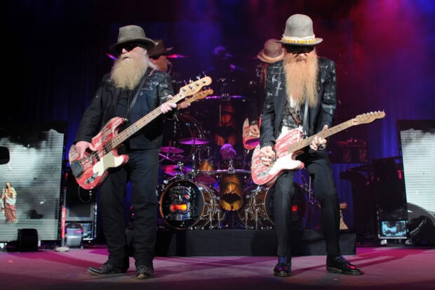 ZZ Top performing live on stage with guitars and drums, HD Desktop Wallpaper