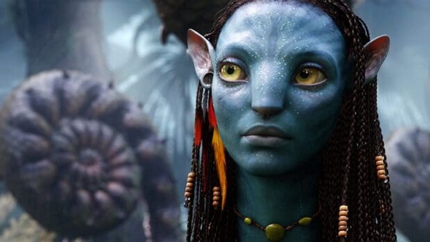 A close up view of Zoe Saldana's Avatar character with detailed facial features and decorations, HD Desktop Wallpaper