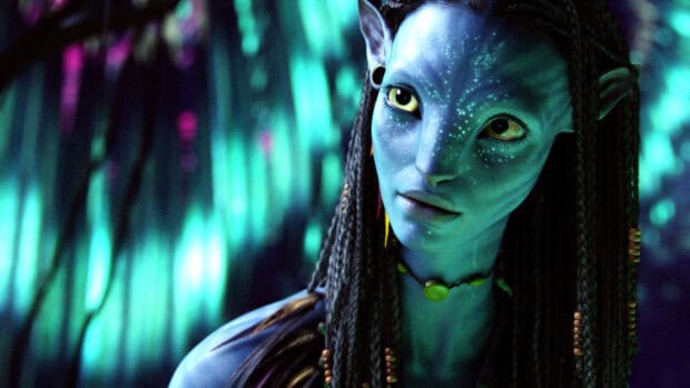 A close up of Zoe Saldana as Neytiri from Avatar showing detailed facial features, 2K Desktop Wallpaper