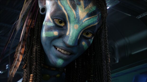 Zoe Saldana in Avatar close up showing detailed face paint and yellow eyes, HD Desktop Wallpaper