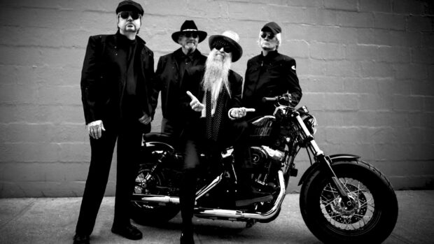 The Zz Top band members stand near a motorcycle in black and white, HD Desktop Wallpaper