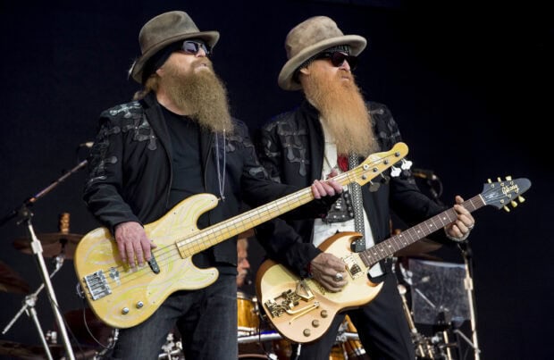 Two musicians with long beards playing guitars on stage for Zz Top wallpapers, 2K Desktop Wallpaper