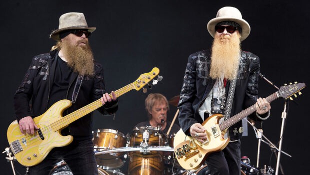Zz Top is playing guitars during a live concert performance, HD Desktop Wallpaper
