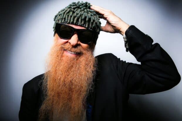 A smiling man with a long beard wearing sunglasses and a textured hat representing Zz Top wallpapers, HD Desktop Wallpaper
