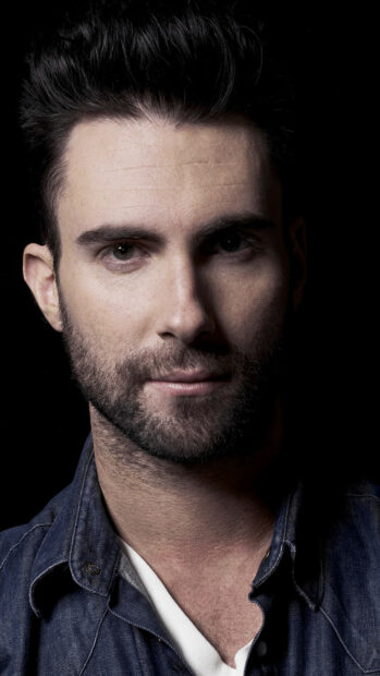 A close up portrait of Adam Levine with a beard and denim jacket, HD iPhone Wallpaper
