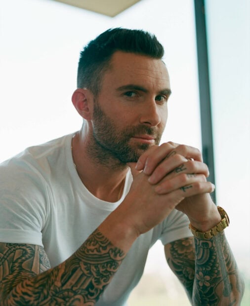 Adam Levine with detailed tattoos and a contemplative expression, HD Desktop Wallpaper