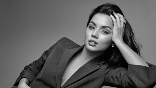 Ana De Armas is posing with her hand on her head in a black and white portrait, 4K Desktop Wallpaper